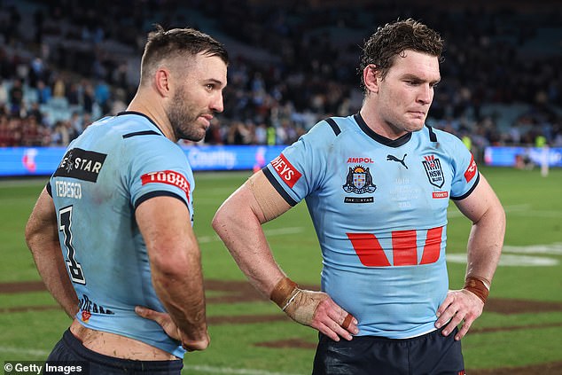 James Tedesco (left) and Liam Martin (right) said it all with their facial expressions after the defeat, which was practically sealed as soon as Suaalii lowered his shoulder.