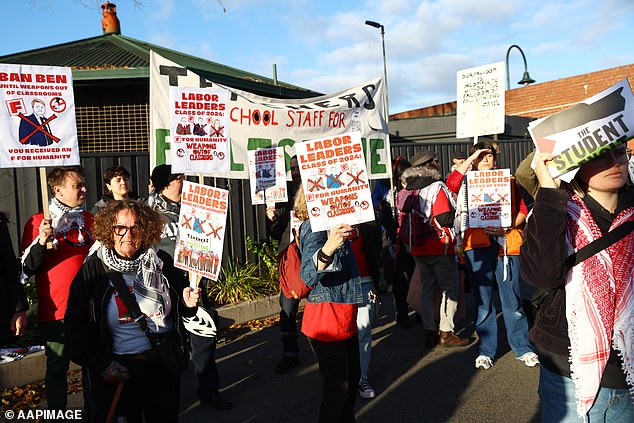 Activists with banners gather during a pro-Palestine rally outside the 2024 Victorian Labor state conference in Melbourne, Saturday, May 18, 2024.