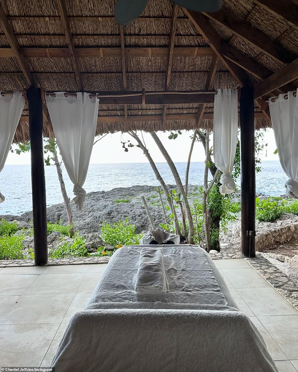 The massage table was indoors with views of the spectacular coastline.