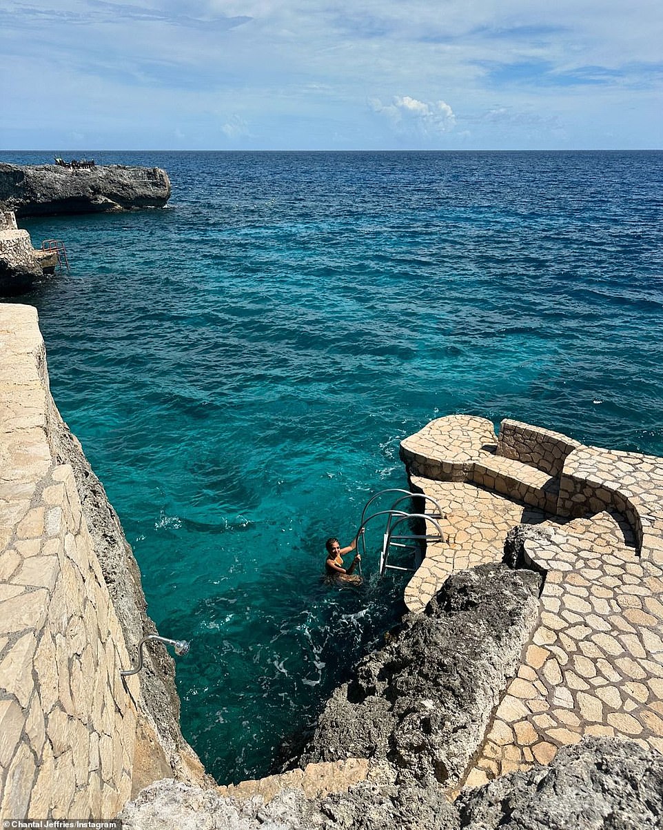 Here a friend was using the stairs to get out of the water and onto a flagstone patio.