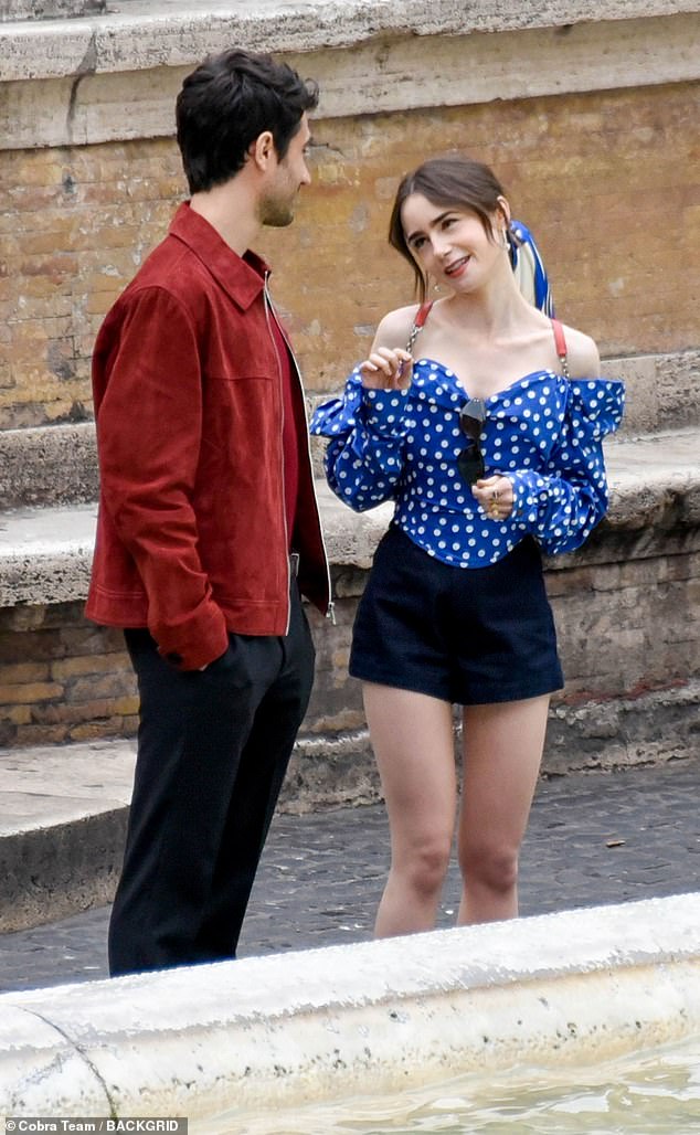 New photos from the upcoming series showed Emily gazing lovingly at a handsome man, played by actor Eugenio Franceschini, during scenes filmed in Rome at the Trevi Fountain.