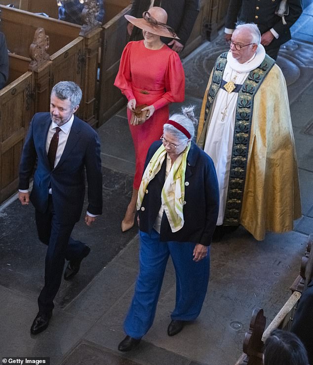 The mother of four entered Holmen Church in central Copenhagen behind her husband Frederik.