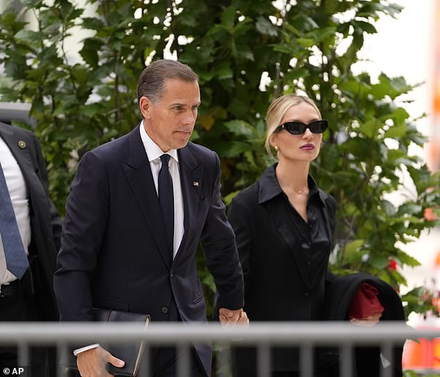 Hunter, who is on trial for lying about his drug addiction on a federal form to purchase a gun, was photographed arriving at a federal courthouse in Delaware with his wife Melissa Cohen on Wednesday morning.