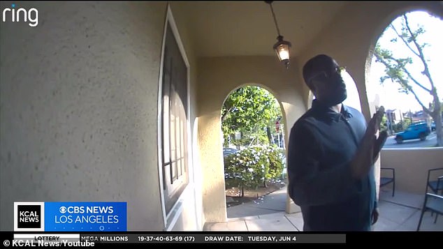 In the video, the man appeared to be talking to himself as he approached the front door before entering the residence.