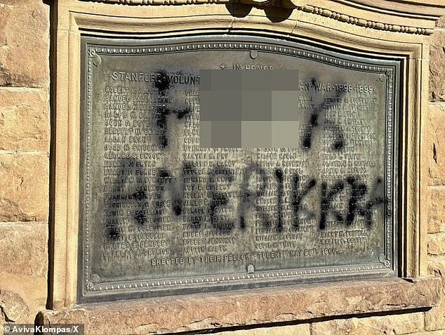 Photos of the damaged campus posted on social media show 'F*** Amerikkka' was spray painted on a memorial to soldiers killed in the Spanish-American War.