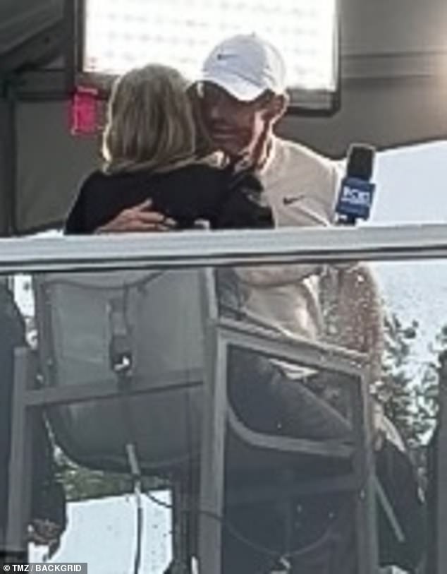 Rory McIlroy was photographed hugging CBS journalist Amanda Balionis after their television interview.