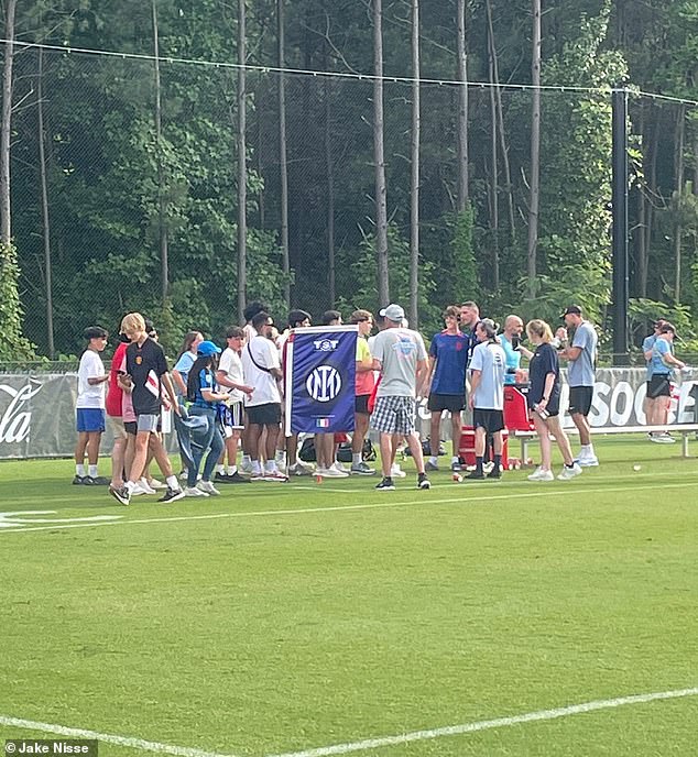 A long line of fans asked for Materazzi's autographs and photographs after the game.