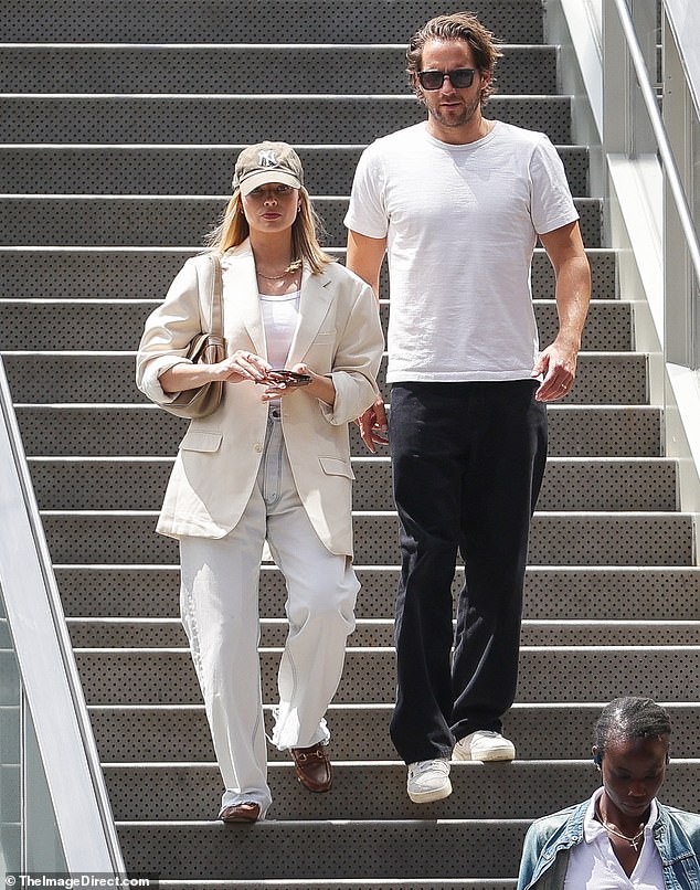 She finished her look with a Celine bag and a cap over her bright blonde locks.