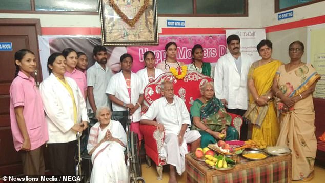 Mangamma and her husband Sitarama Rajarao (pictured, center) spoke to several local doctors before undergoing IVF treatment.