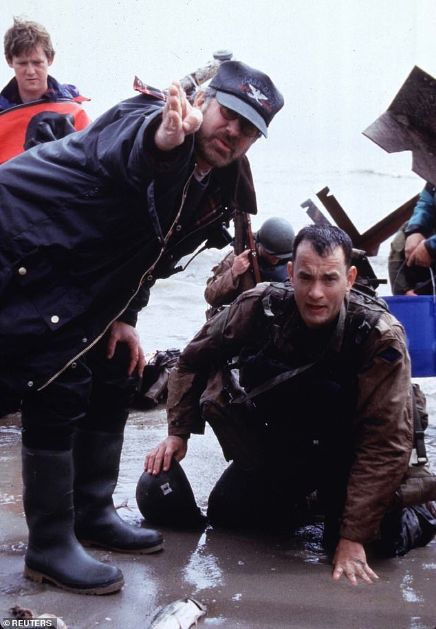 Spielberg and Hanks photographed while filming the iconic opening scene showing the landings in Normandy.