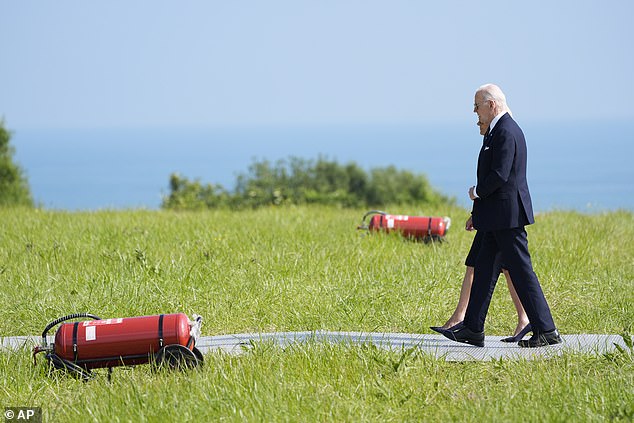 President Joe Biden and first lady Jill Biden exit Marine One as they arrive at the Normandy American Cemetery, where they will attend ceremonies commemorating the 80th anniversary of D-Day.