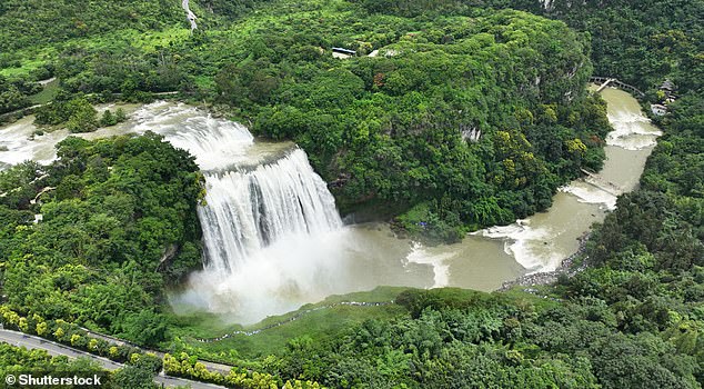 The famous Huangguoshu waterfall (pictured) in the southwestern province of Guizhou has been assisted by water diverted from a nearby dam.