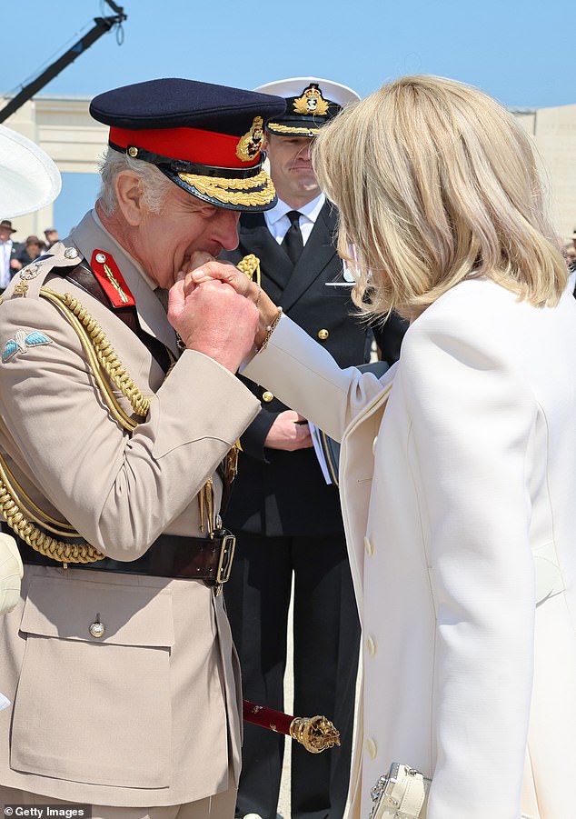 King Charles greeted Ms Macron with a kiss on the hand and showed no signs of annoyance after the French president and his wife arrived late.