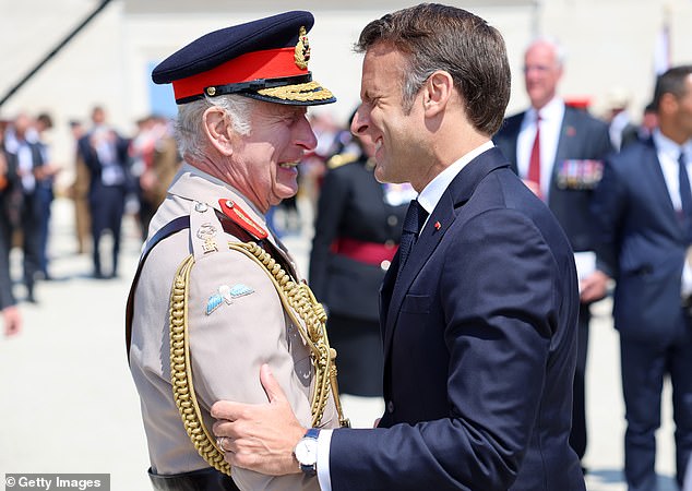 Her Majesty and President Macron laughed as they chatted before the ceremony began.