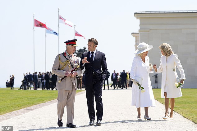 The King and Macron began to catch up while Camilla and Brigitte became animated as they chatted and walked together.