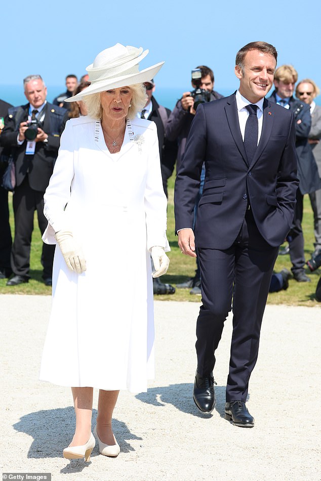 Queen Camilla is seen with President Macron as leaders gather in Normandy to mark D-Day.