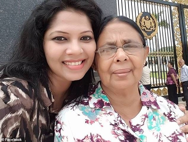 Mrs. Rodrigo (pictured with her daughter) contracted a fatal disease called Buruli ulcer and had to have her left hand amputated.