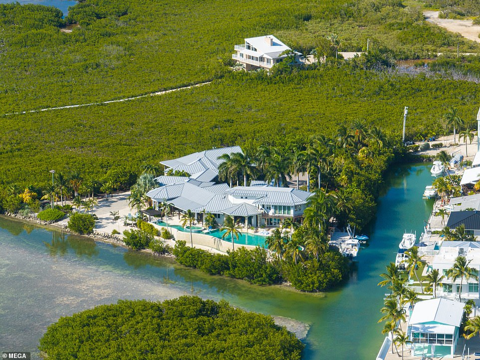 The 26-year-old blonde bombshell's home is over 7,000 square feet and features a gym, game room, elevator, aquarium, wine room and chef's kitchen.