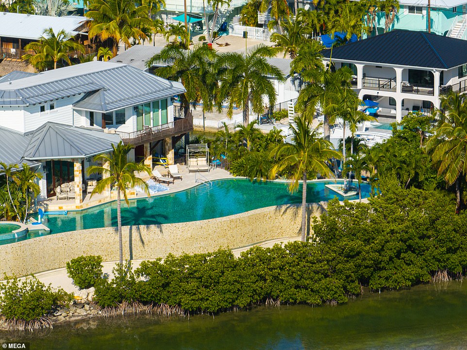 The pool is heated and cold and is a saltwater infinity pool.