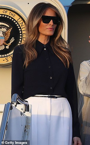 Melania wore a silky black blouse when she greeted Japanese Prime Minister Shinzo Abe and his wife at Palm Beach International Airport in 2017.