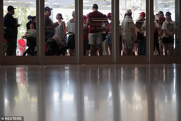 Supporters of former President Donald Trump are photographed waiting outside on Friday in Phoenix, Arizona.