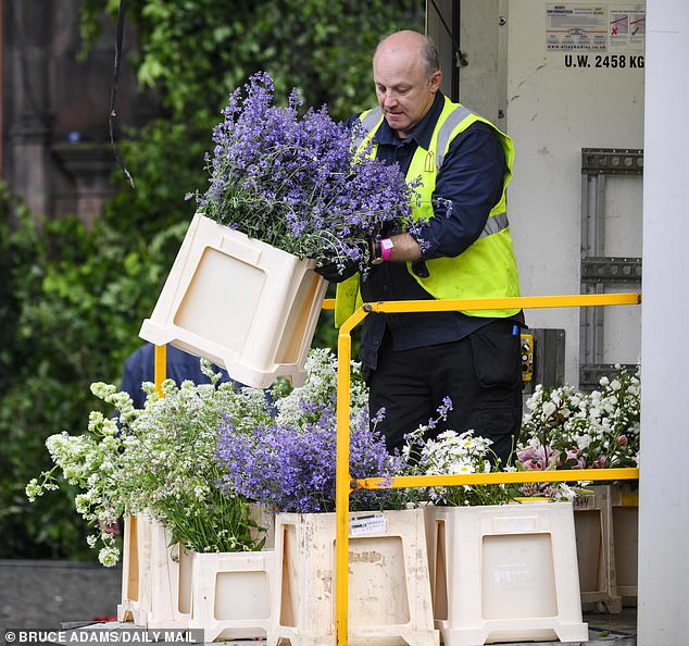 ...and spectacular flowers in shades of purple and white arrive by truck