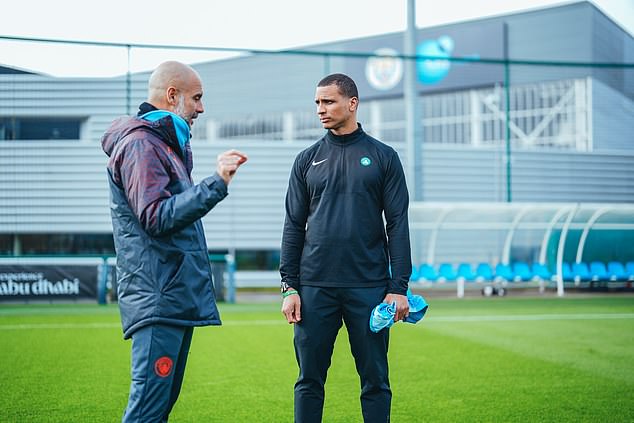 The Boston Celtics coach (right) met Pep Guardiola (left) at City's training base in February.