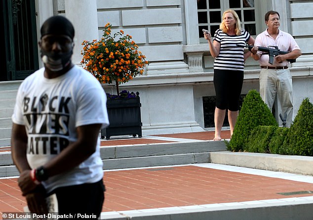 No shots were fired and no one was hurt as the stone-faced couple guarded their home.