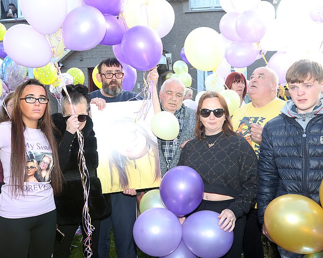 Mourners held an emotional vigil and released balloons in memory of the victim