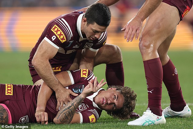 Walsh was taken out of the State of Origin opener inside the first eight minutes (pictured) when the Blues' rookie center stepped off the line and hit him high and late.