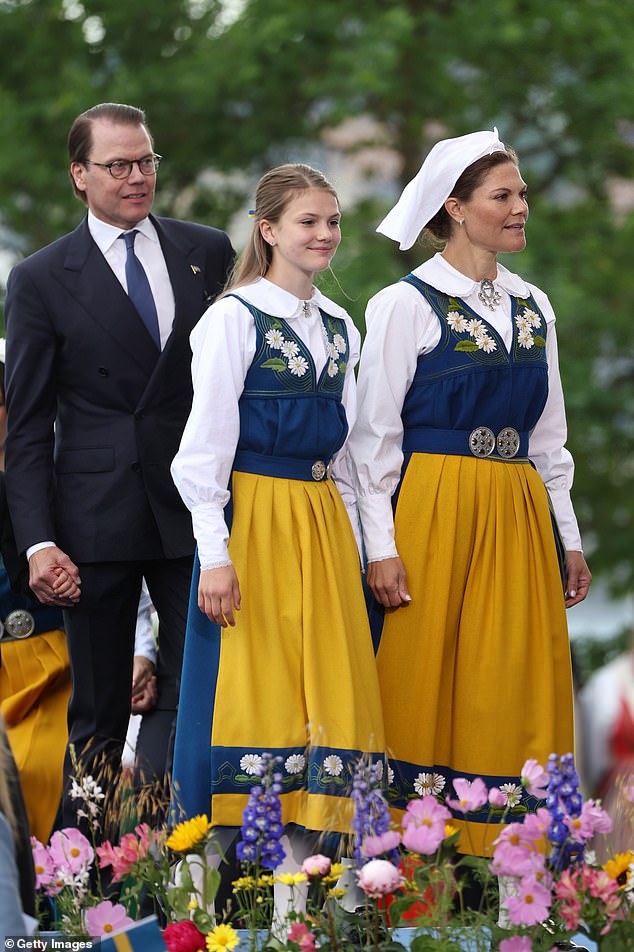 Crown Princess Victoria and Princess Estelle held hands as they walked while Prince Oscar held his father's hand.