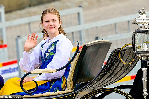 Princess Estelle, 12, looked regal as she waved to crowds in Stockholm during the festivities today.