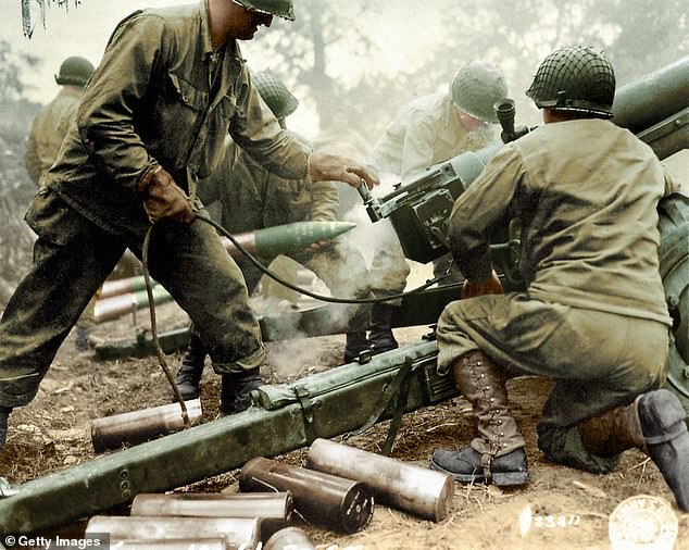 American soldiers from the 4th Infantry Division firing a 105mm HM3 howitzer in the days after the D-Day landings at Carentan, a French town near Utah and Omaha beaches.