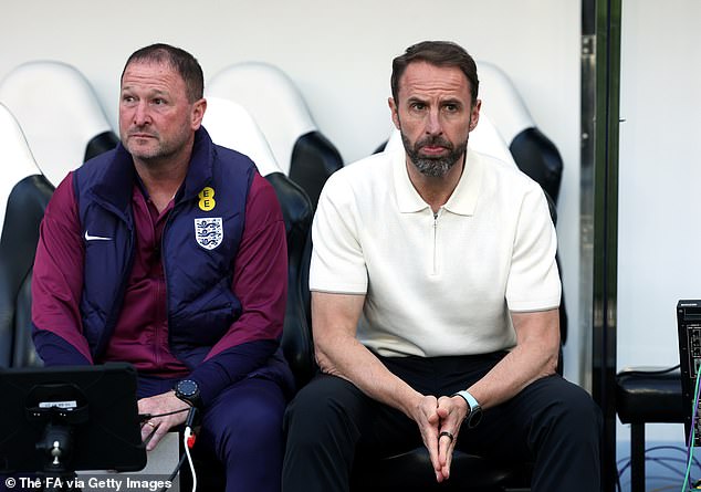 Holland (left) allegedly questioned White's interest in soccer while they were in Qatar for the World Cup.