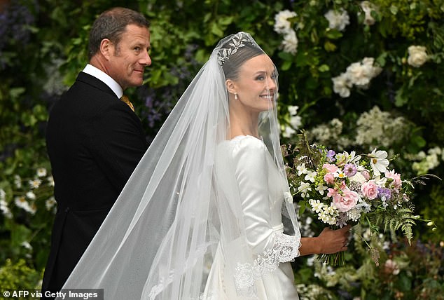 Olivia looked stunning as she arrived at her wedding to the Duke of Westminster today.