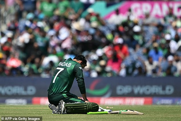 Pakistan's Shadab Khan takes a break from the heat during the men's pool of the ICC Twenty20 World Cup 2024 on June 6 at the Grand Prairie Cricket Stadium in Grand Prairie, Texas.