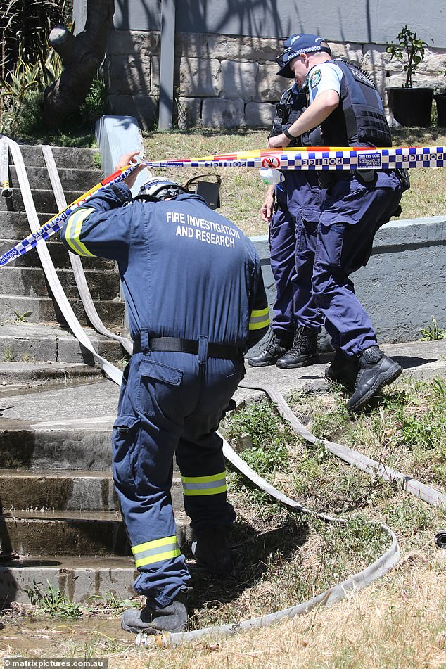 Police are seen responding to the burned-out home of YouTuber FriendlyJordies in late 2022.