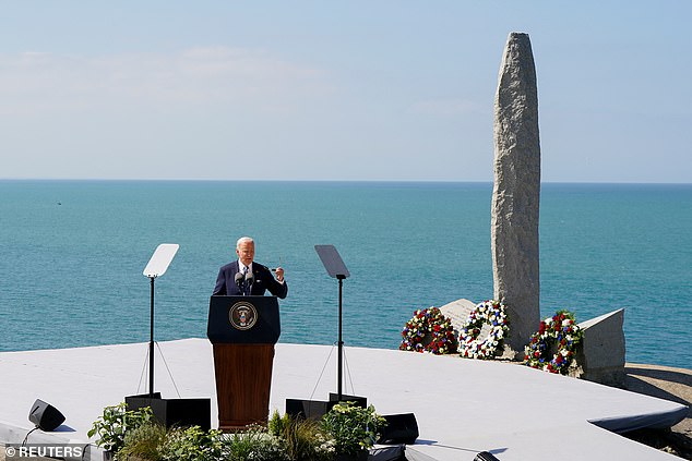 US President Joe Biden delivers a speech at the Pointe du Hoc World War II Ranger Memorial following the 80th anniversary of the 1944 D-Day landings.