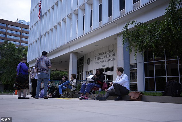 Media gather outside the US Courthouse of the J. Caleb Boggs Federal Building, Friday, June 7, 2024