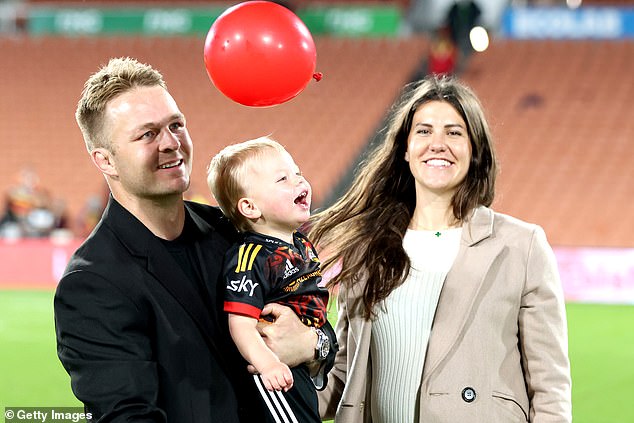 Retired Chiefs player Sam Cane with his son Hudson and wife Harriet Cane were at the game.