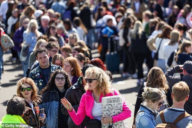 Taylor Swift fans queuing outside the stadium a day before the sold-out concert