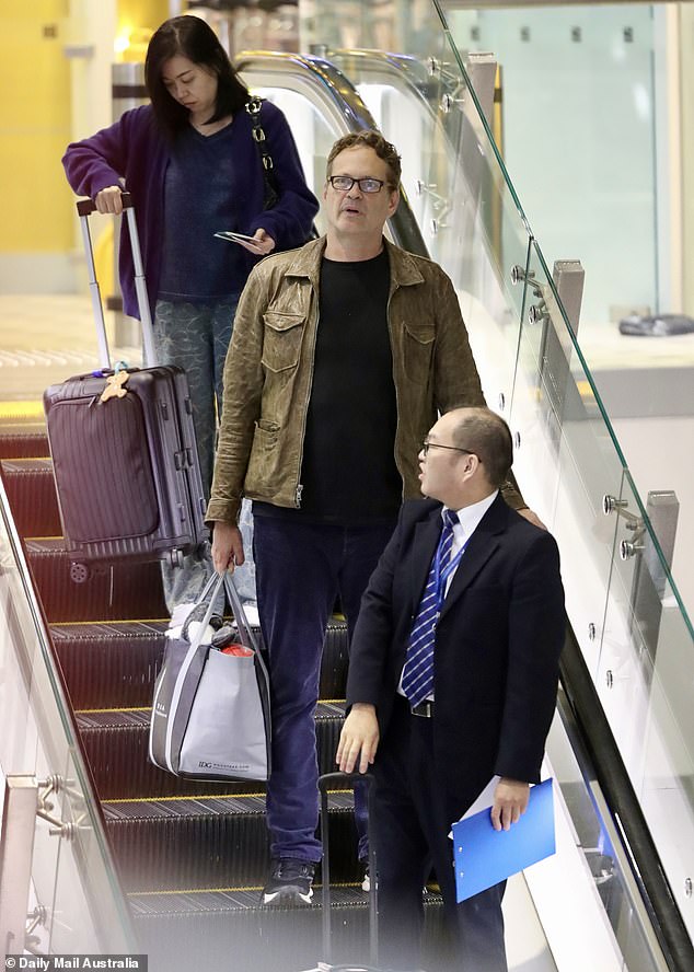 The Swingers actor was also seen carrying a carry-on bag as he walked to the terminal with airport staff.