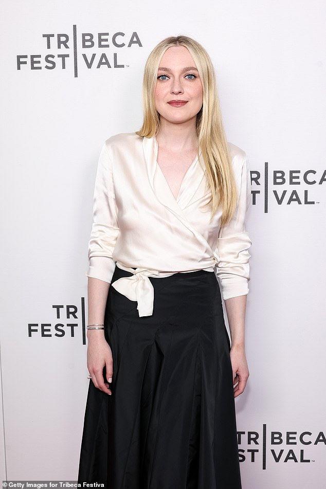 1717818996 706 Dakota Fanning stuns in a white top and black midi