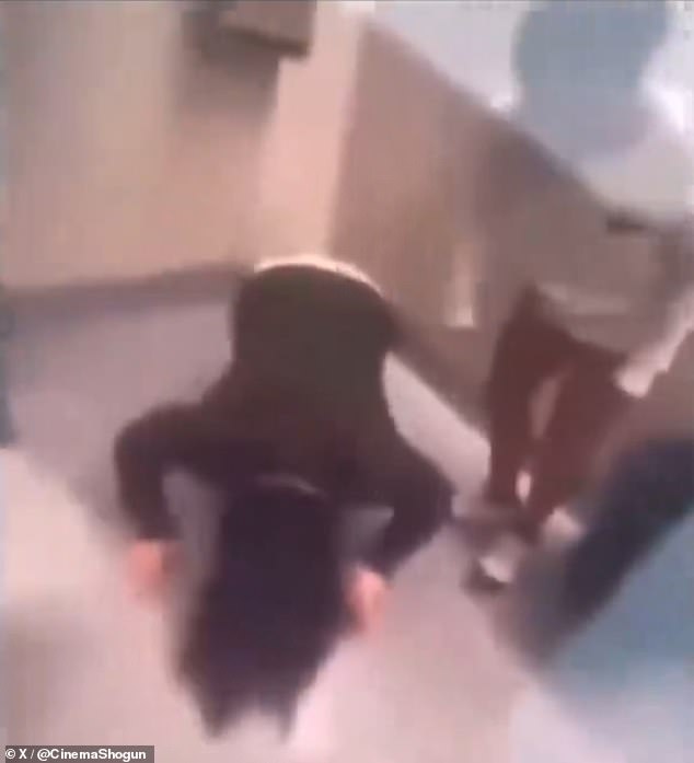 Gloating accomplice filmed as Aliyah's tormentor made her lick the bathroom floor