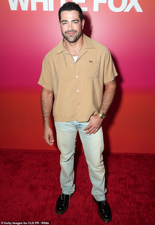 Desperate Housewives heartthrob Jesse Metcalfe exuded showbiz magnetism in a tan shirt that opened just enough to give away a hint of his undershirt.