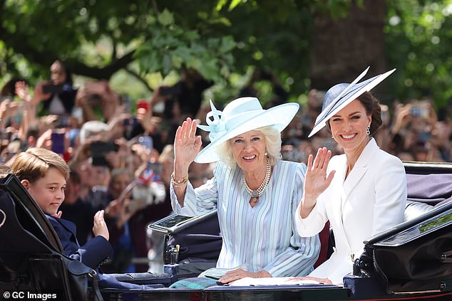 In 2022, Kate opted for a white blazer-style dress with sharp lapels and flared skirt by Alexander McQueen that she already wore in 2017, with a white and blue Philip Treacy hat. Camilla also recycled a previously worn outfit, choosing a blue striped dress by Bruce Oldfield with a hat also by Philip Treacy.