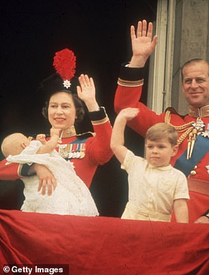 Queen Elizabeth waves with her husband, Prince Philip, and their son, Prince Andrew, while holding baby Prince Edward at Trooping the Color in 1964.