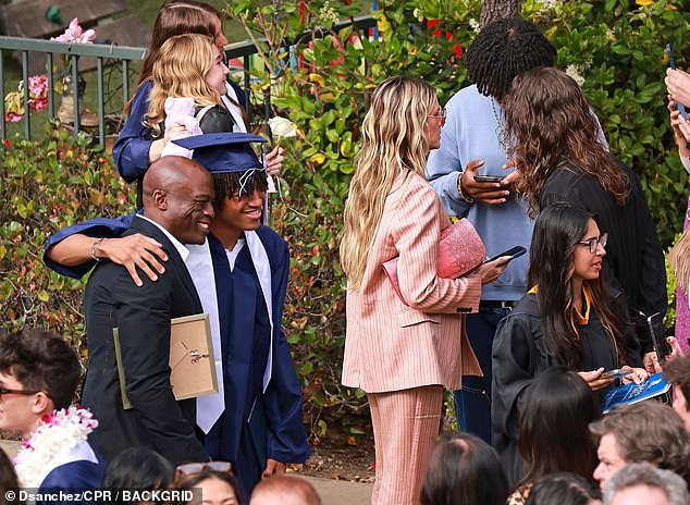 Seal and Heidi didn't pose for any photos together, but they were seen close to each other as they celebrated their son's big day.