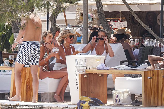 They were in Ibiza to spend time with their friend Rachel Bayliss who lives on the Spanish island.