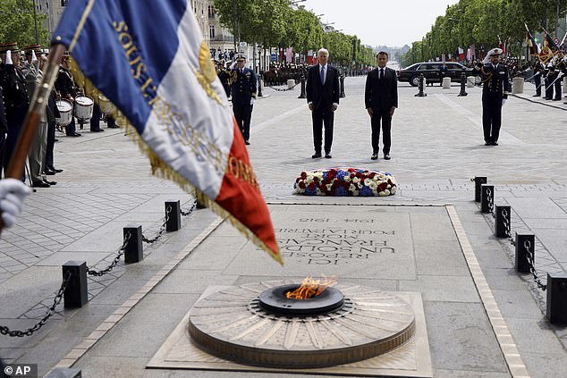 The two presidents laid flowers at the Tomb of the Unknown Soldier during a ceremony at the Arc de Triomphe to mark the start of the state visit.